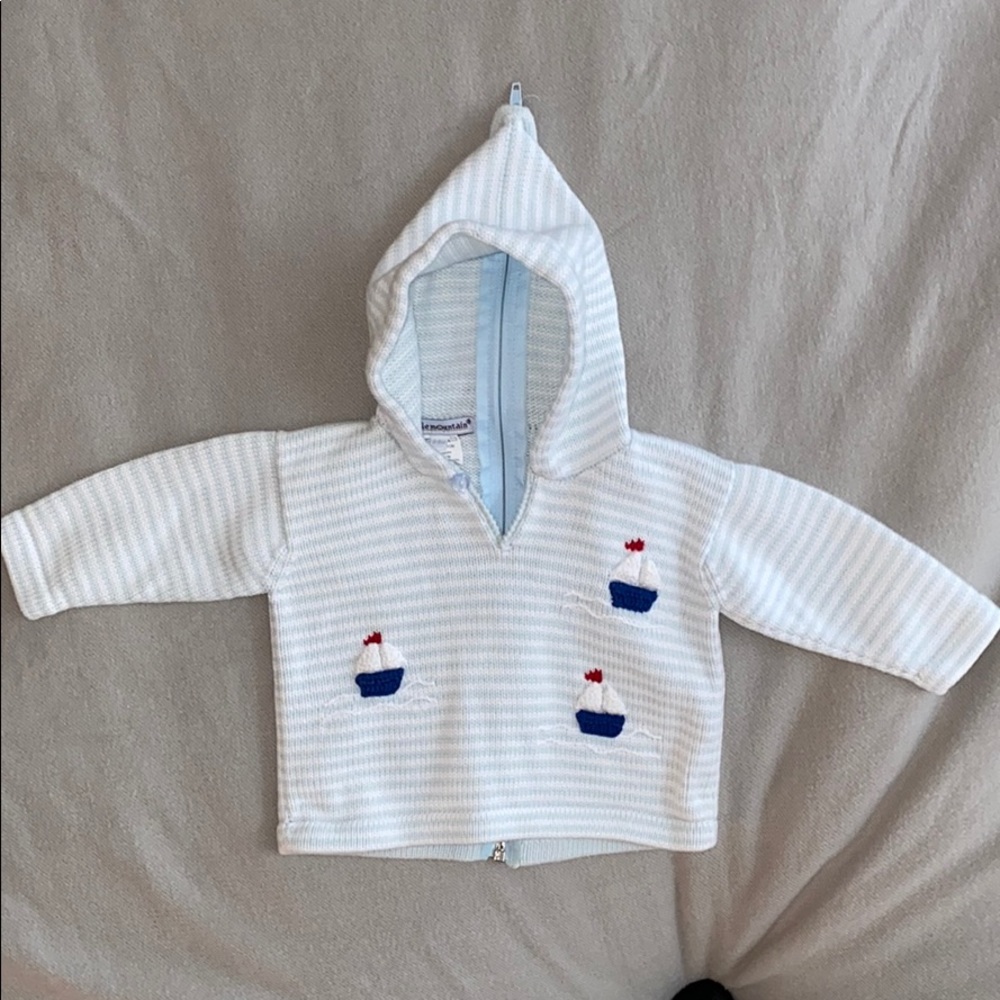Knitted hooded sailboat sweater with back zipper